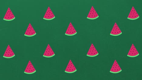 animación de sandías individuales flotando sobre un fondo verde