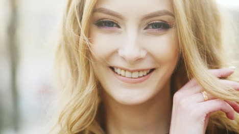 Portrait-Of-A-Beautiful-Woman-The-Wind-Blowing-In-Her-Hair-She-Is-Happy