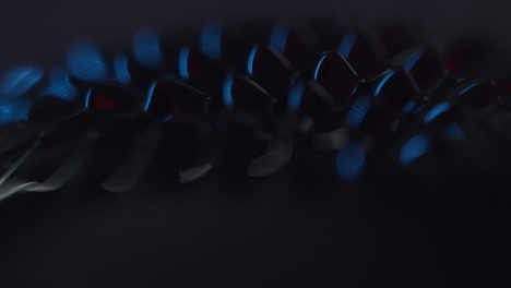fluid forming spikes in a dark abstract atmosphere