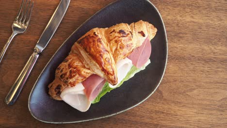 croissant sandwich on a plate