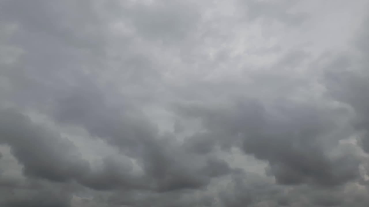 Summer sky rain cloud time lapse in the mid afternoon
