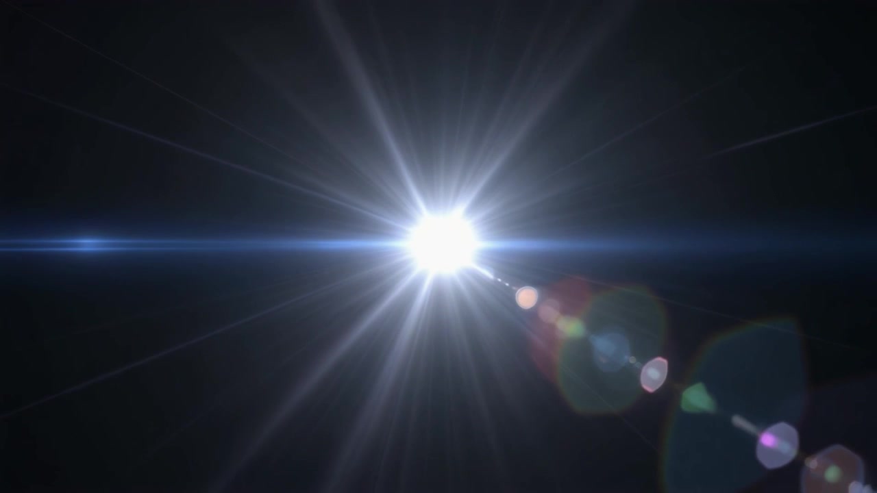 Bagliore di luce bianca brillante con artefatti dell'obiettivo su sfondo nero