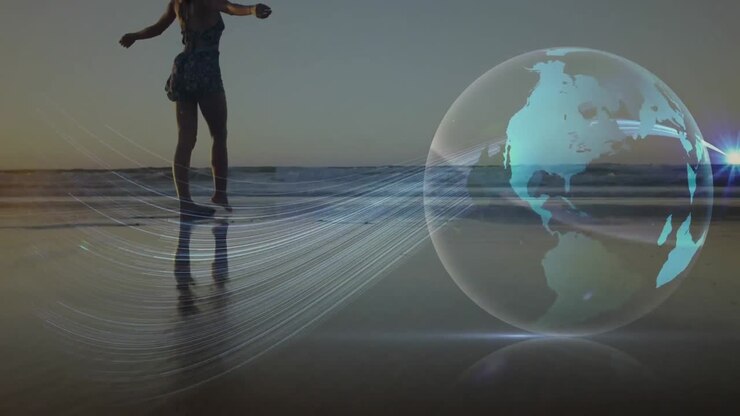 Animation of glowing global network over woman walking on sandy beach