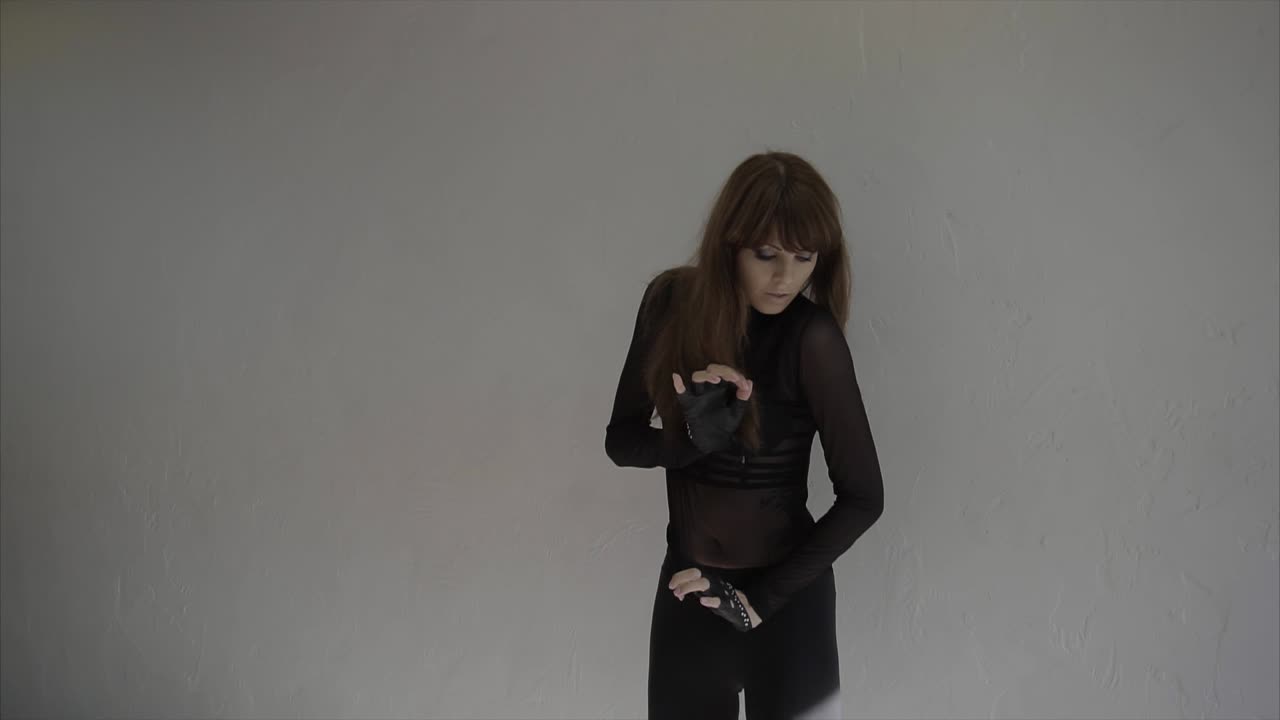Stylish Woman Posing in a Studio