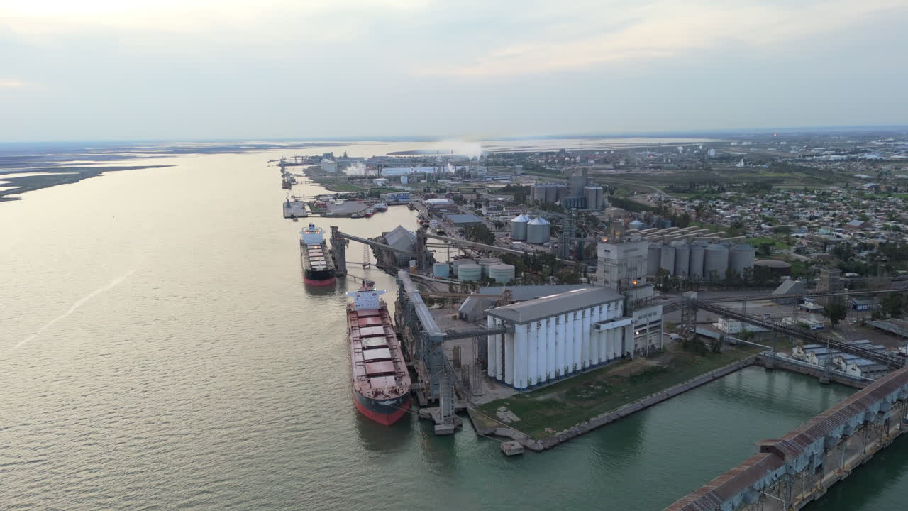 Static shot of the big ships, docking at port of Bahia Blanca, waiting for transportation world wide, argentina, copy space