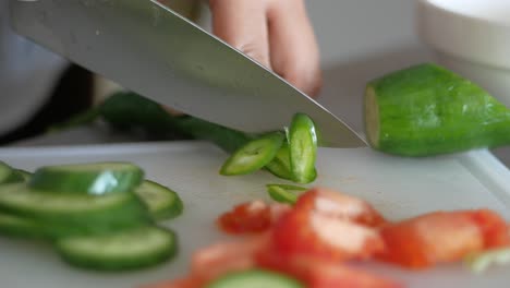 chopping vegetables for salad