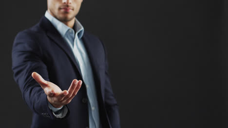 video of biracial businessman using holographic display, copy space