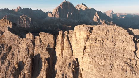 aerial view of mountain peaks during sunrise in the dolomites, italy