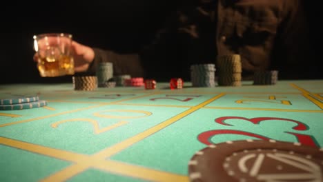 Casino Roulette Table with Player