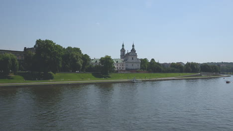 view on vistula river and church of st michael the archangel in krakow