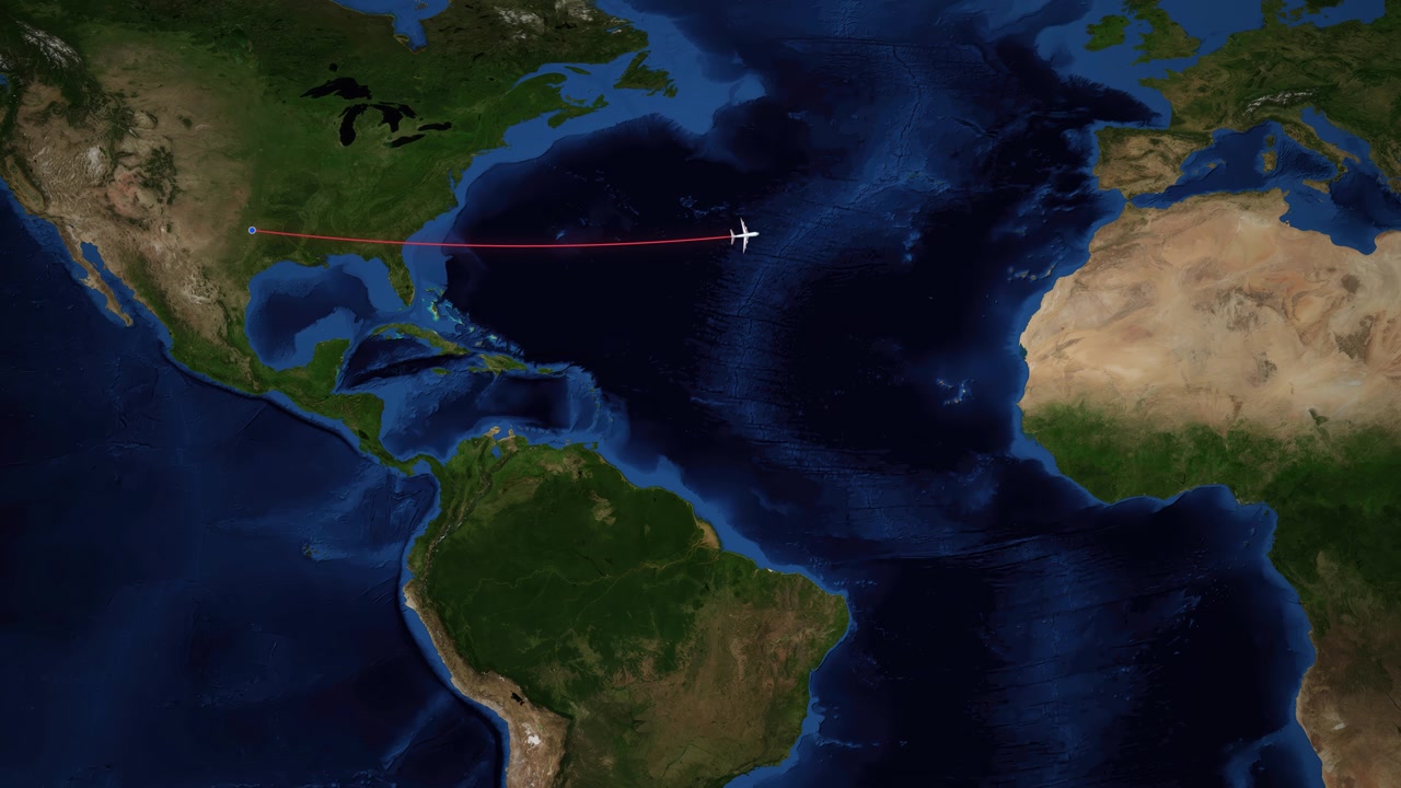 A digital animation tracks a plane flying from Dallas to Madrid over the Atlantic Ocean