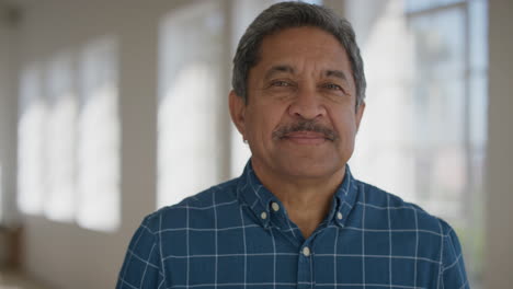 close up portrait of middle aged man looking serious confident at camera in calm successful retired senior male