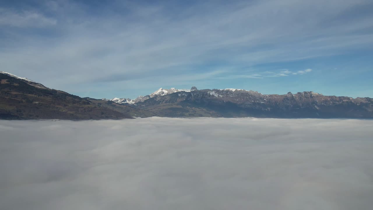 Drone shot flying just above the fog in the Rhein Valley