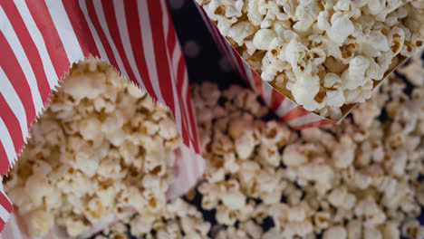 animation of boxes of popcorn over white spots