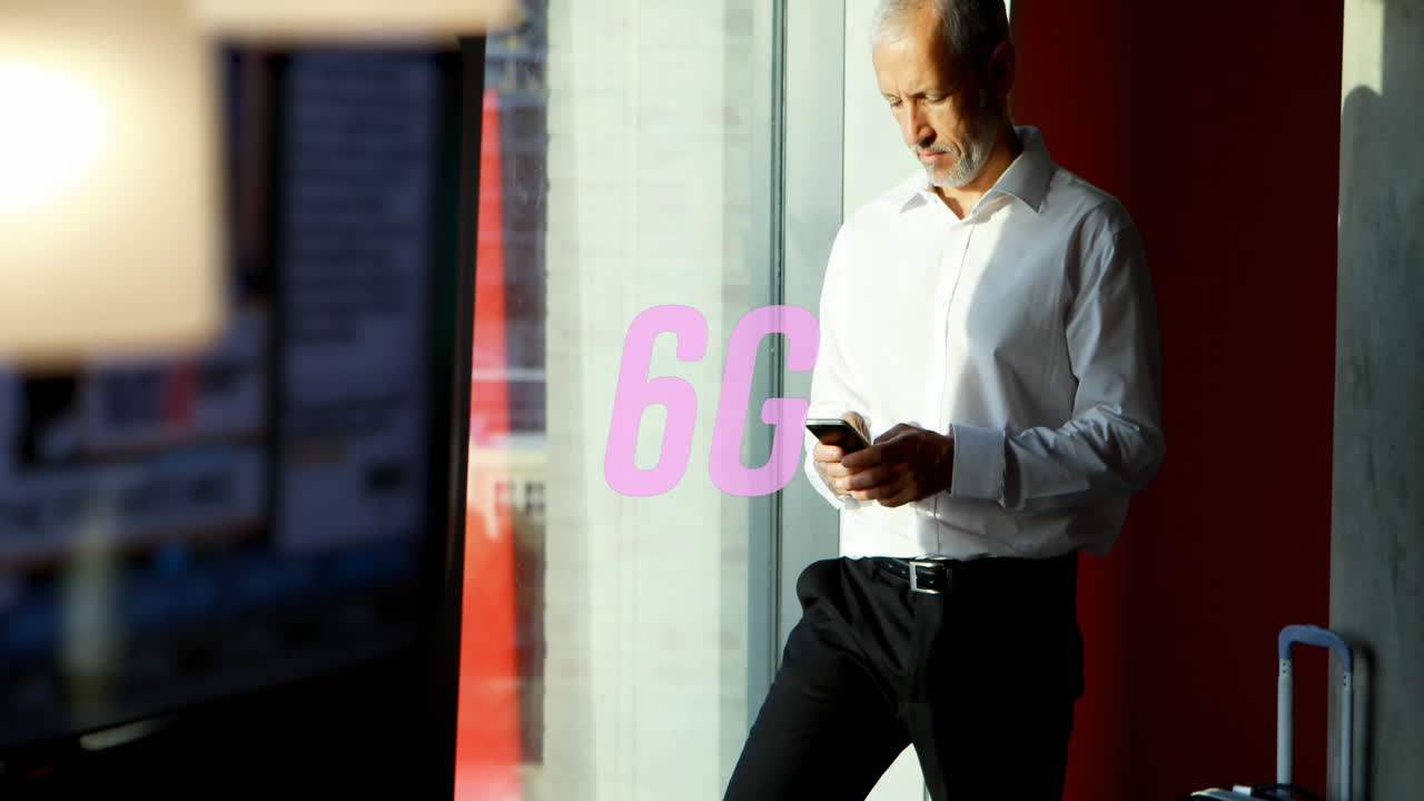 Animation of 6g text over caucasian businessman using smartphone