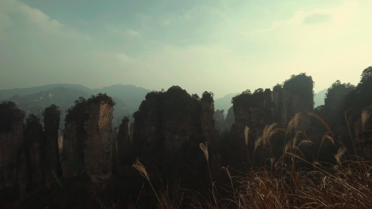 Epic Wide Shot of Avatar Mountains Peaks Rising from the Misty Valley
