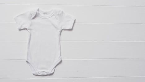 video of white baby grow with copy space on white background