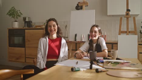 mother and daughter enjoying an art session