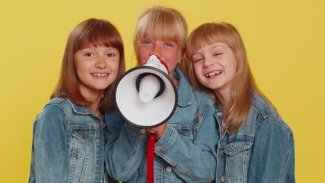 three girls friends scream shout in megaphone proclaiming news loudly announcing advertisement