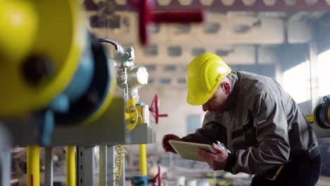 worker with hardhat at the factory