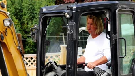 engineer driving excavator