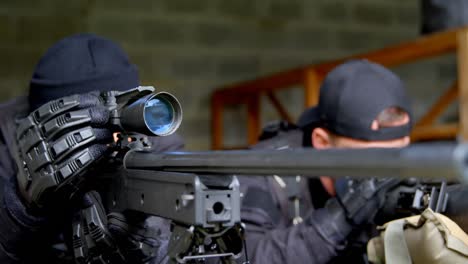 Close-up-of-caucasian-military-soldiers-looking-through-binoculars-and-riflescope-at-training-4k