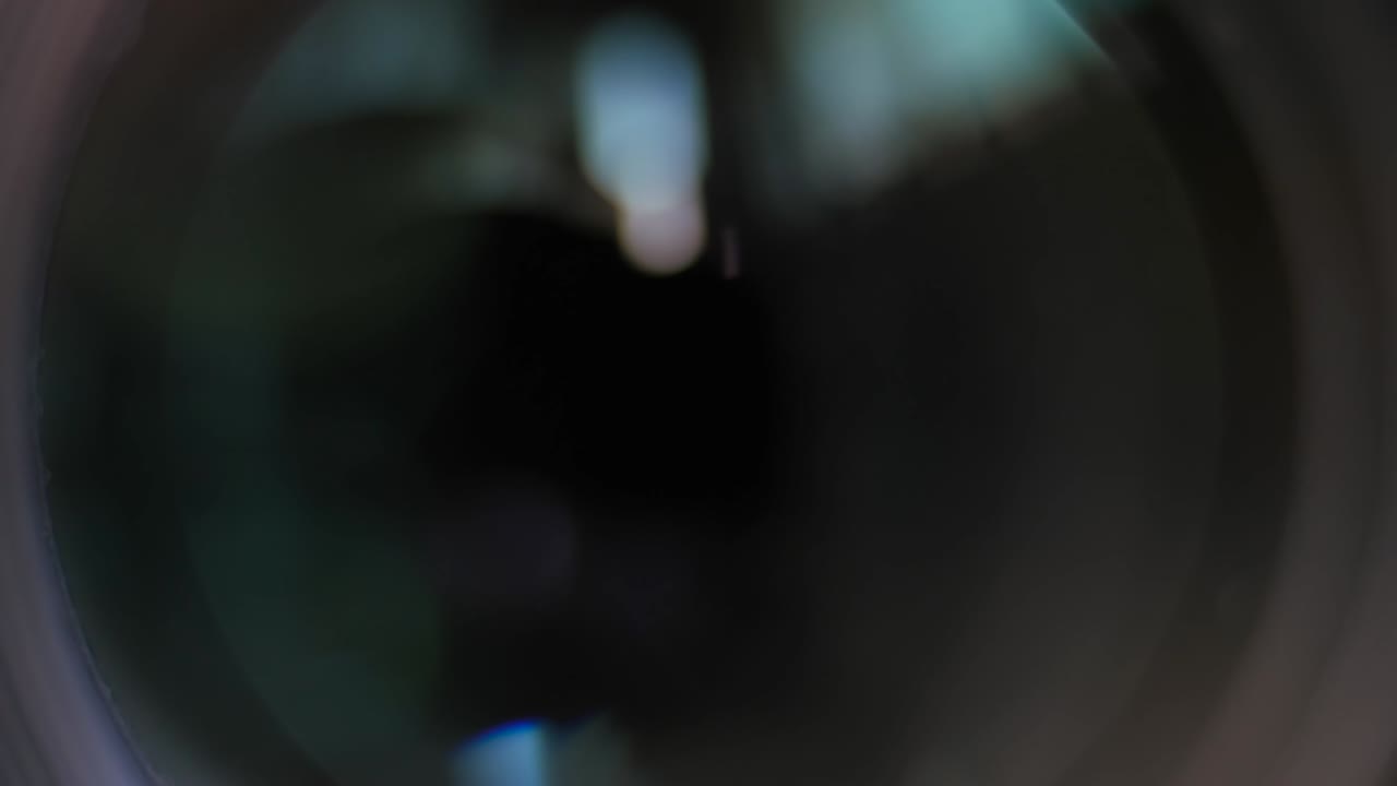 Closing the camera lens eye.