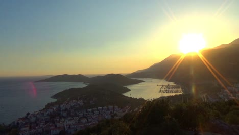 timelapse of sunset dipping behind the mountains from high up in kas turkey