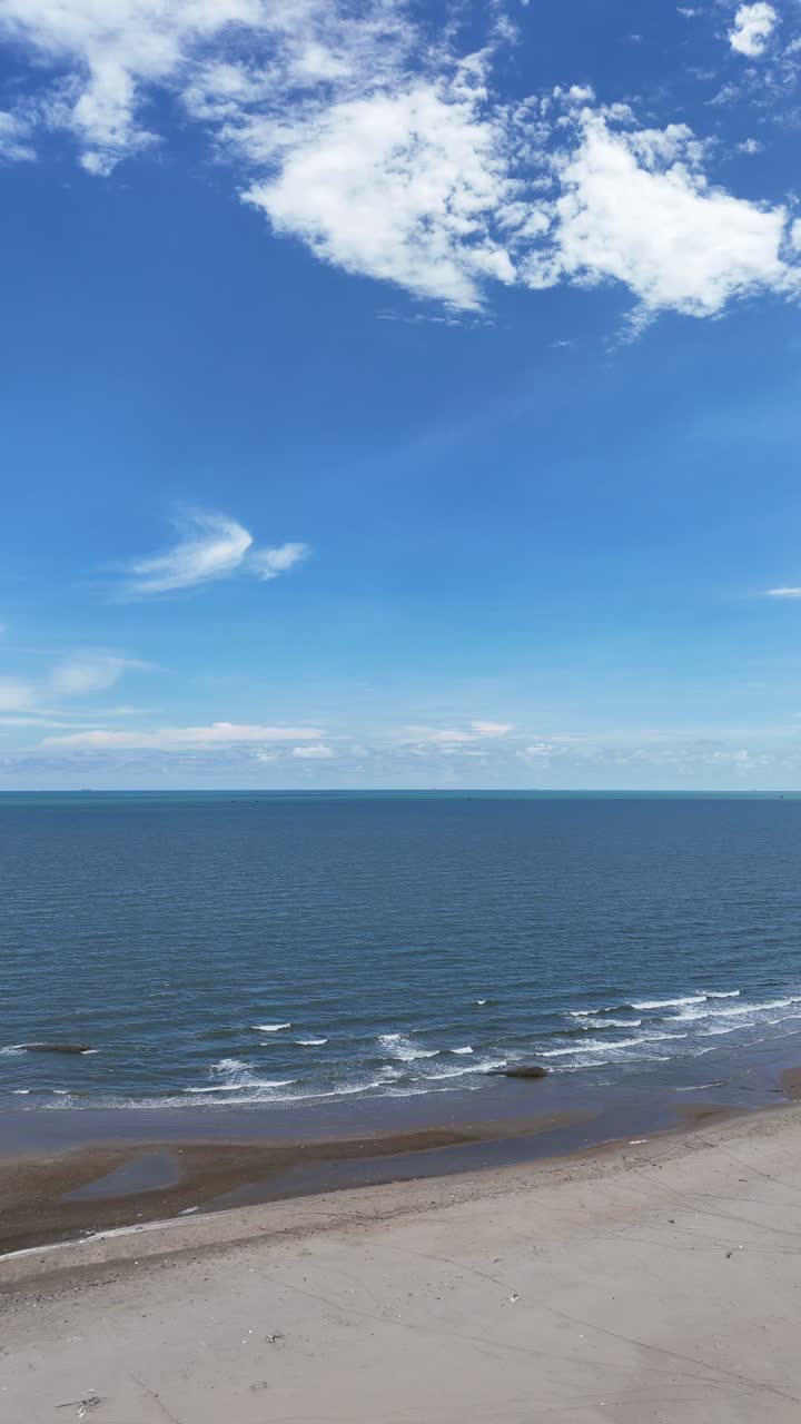 Aerial View Pan of the Beach and the Mountains in La Gi