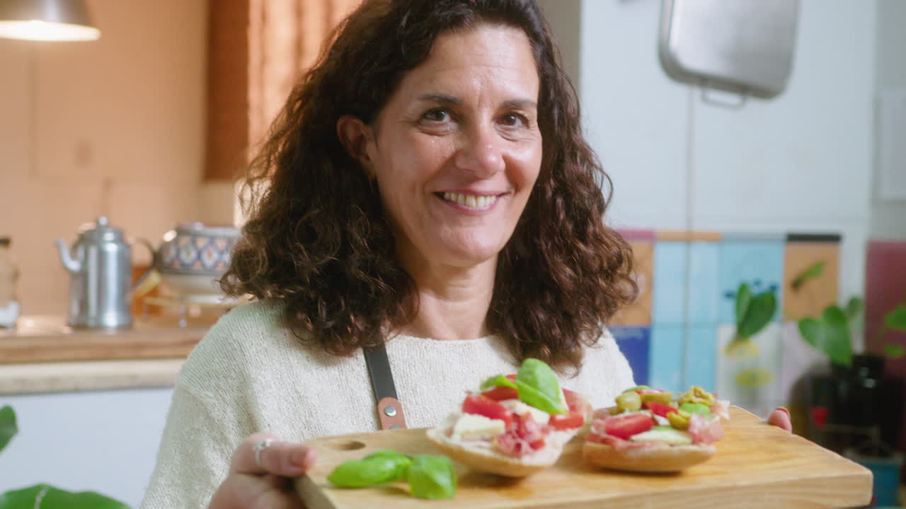 Woman presenting sandwiches