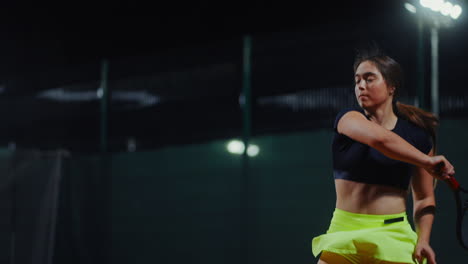woman tennis player at night
