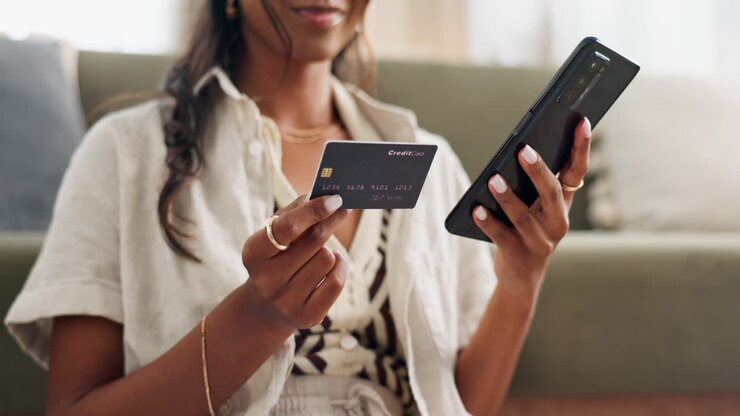 Woman, hands and phone with credit card