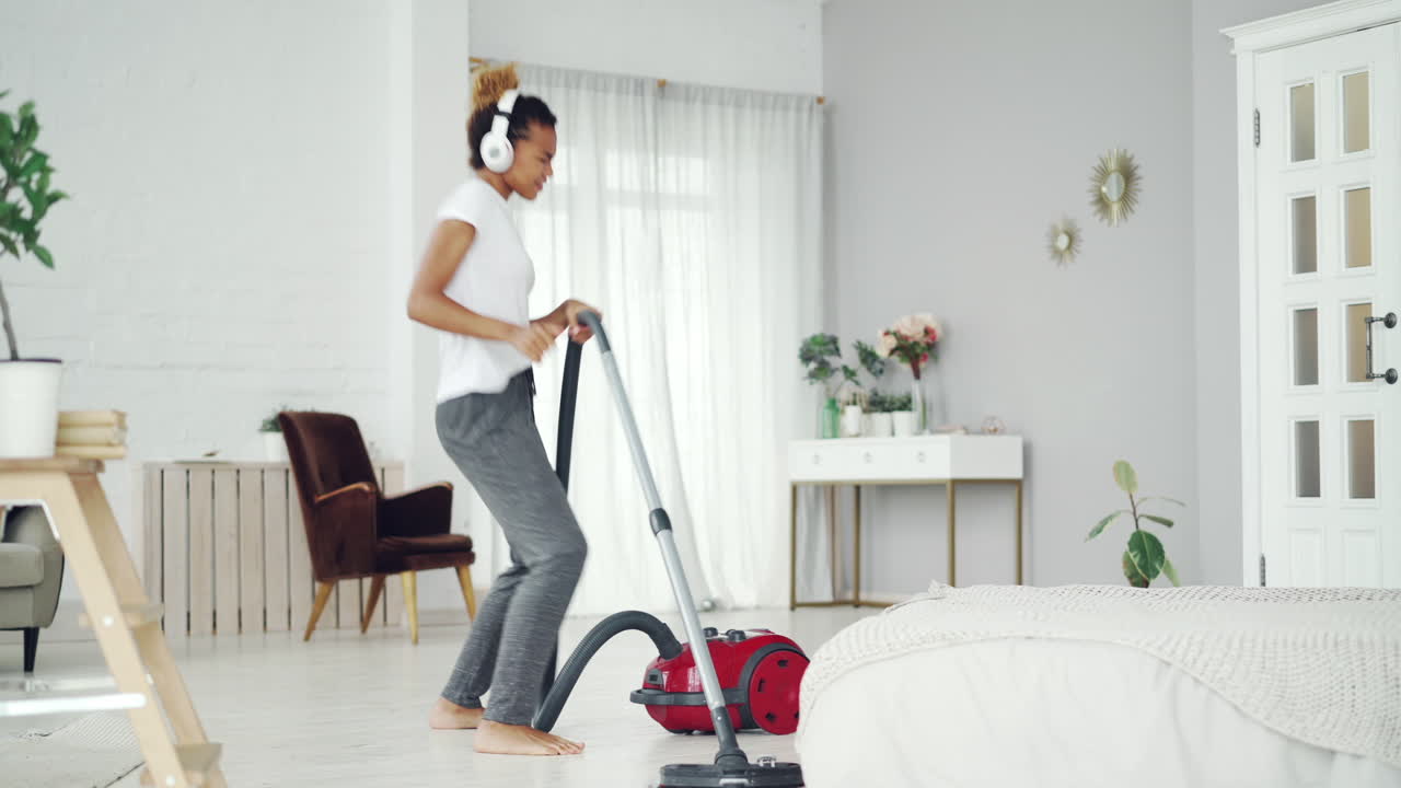 Woman Cleaning with Headphones on