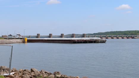 barge slowly moving through lock no