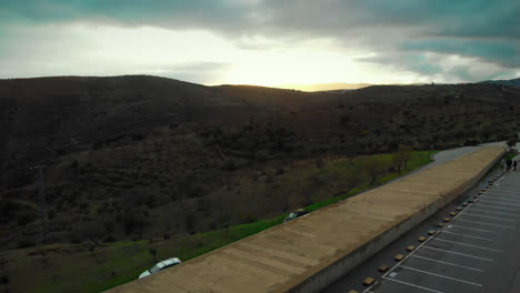rainy countryside mountain at sunset on drone