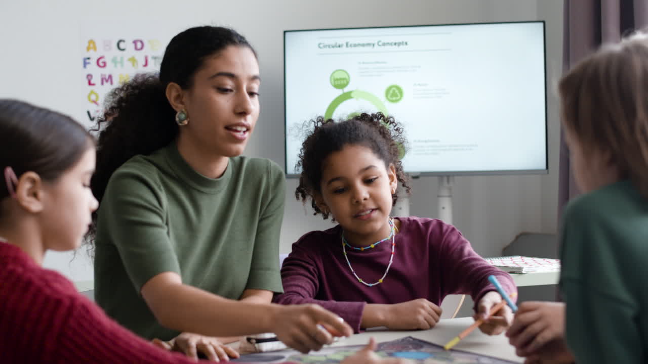 Teacher and Students Collaborating on a Classroom Activity