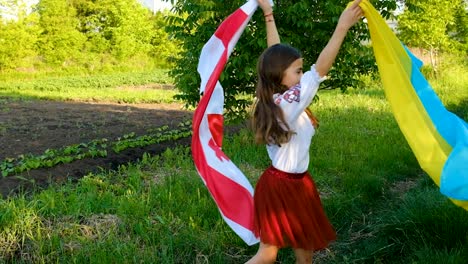 patriot child with ukrainian flag and georgia.. selective focus. kid.