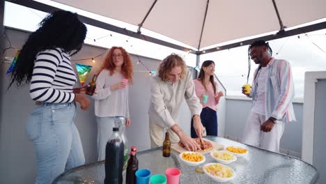 a group of friends having a pizza party