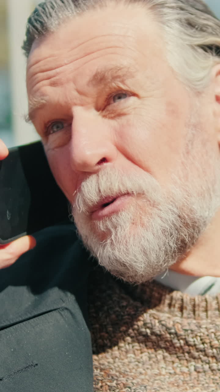 Happy Old Man on Phone in the City