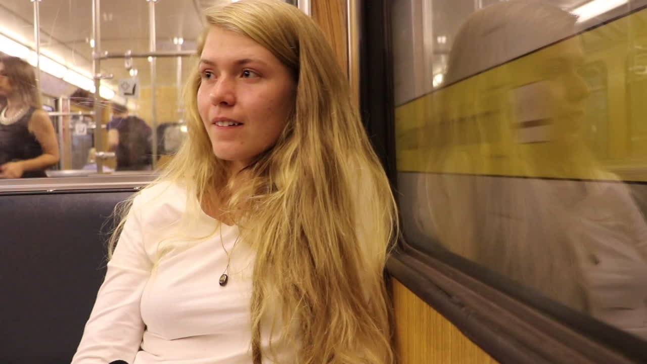 Happy Girl in the Metro in Munich