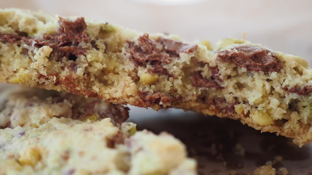 Close-up of a chocolate chip and pistachio cookie