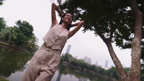woman dancing in a park