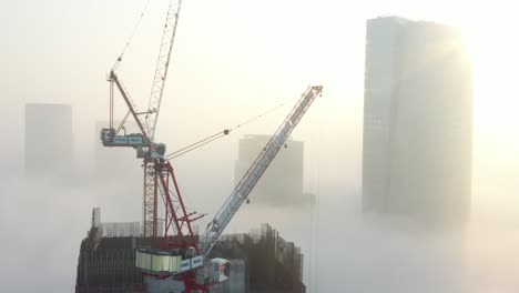 construction of a skyscraper in fog