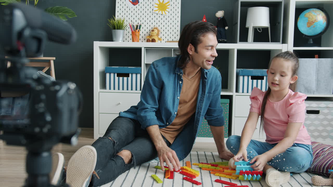 Father and Daughter Play with Building Blocks