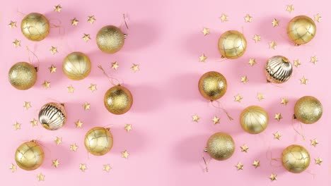 gold christmas ornaments decoration move on pink theme. stop motion