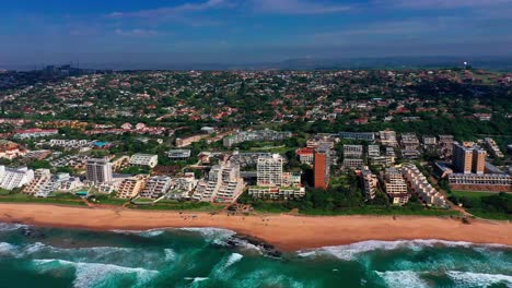 aerial view coastal town and beach on sunny summer day, south africa