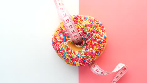 donut with measuring tape