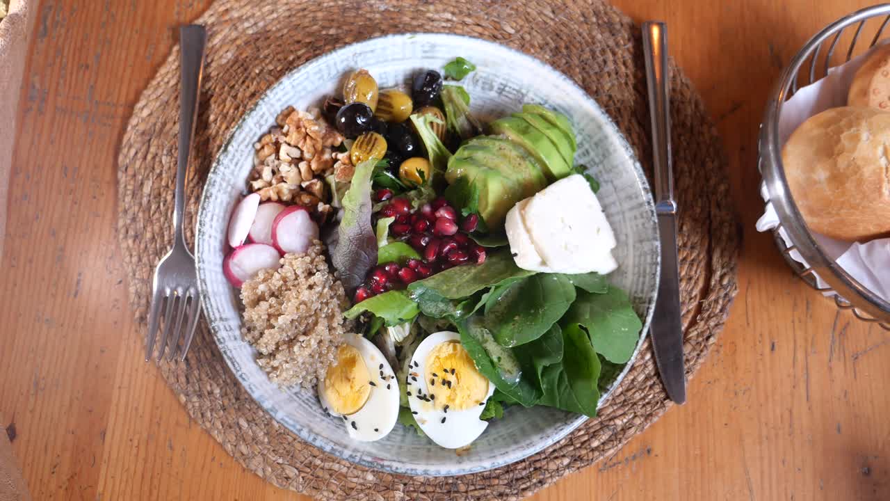 Delicious Healthy Salad with Quinoa, Avocado and other Ingredients