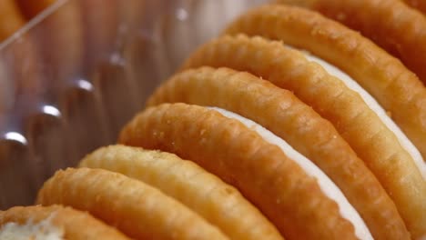 close-up of cream-filled sandwich cookies in a package