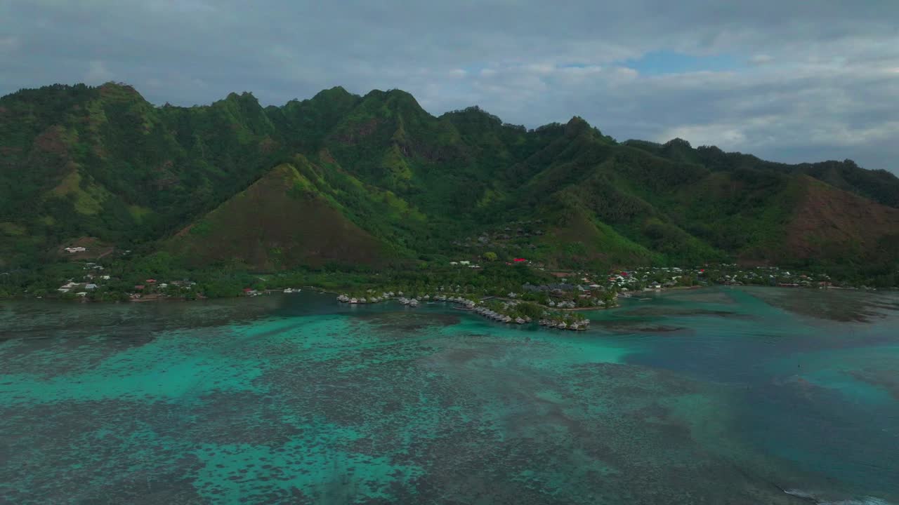 Aerial View of Tropical Island Paradise with Overwater Bungalows